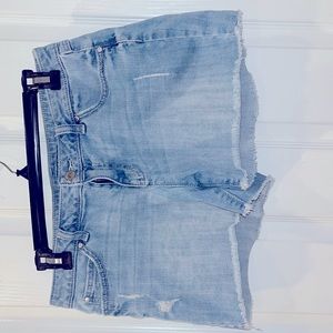 Jennifer Lopez faded denim jean shorts